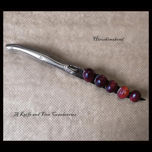 A Knife and Five Cranberries