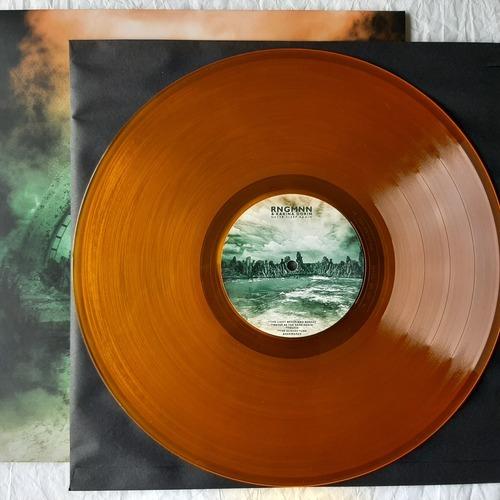 Limited Edition of 100 copies on Clear Orange Vinyl.